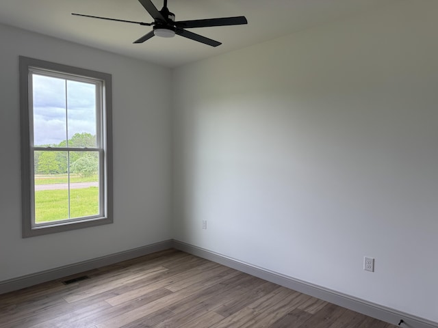 66 Driftwood Way, Corbin, KY 40701 - empty room featuring light wood finished floors, ceiling fan, and baseboards