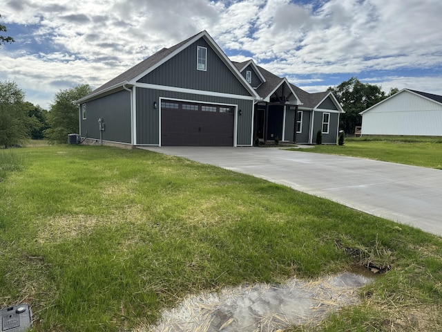 66 Driftwood Way, Corbin, KY 40701 - view of front of home featuring a front lawn, central AC unit, and driveway
