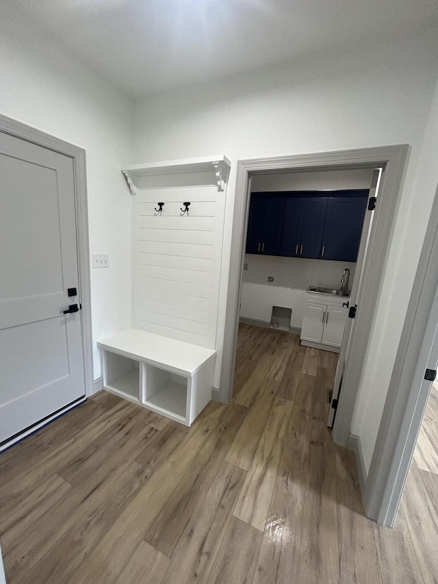66 Driftwood Way, Corbin, KY 40701 - mudroom featuring light wood finished floors and a sink