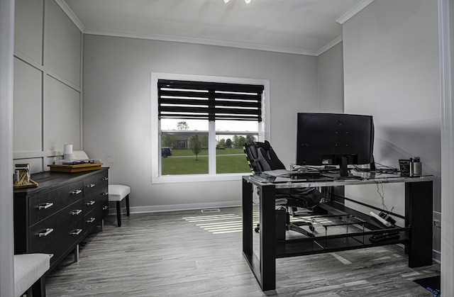 office with ornamental molding, wood finished floors, and baseboards