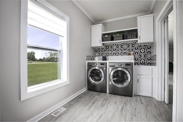101 Creek Ridge Dr, Nicholasville, KY 40356 - washroom with independent washer and dryer, cabinet space, light wood-type flooring, ornamental molding, and baseboards