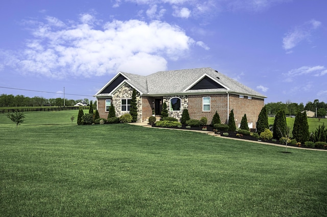 craftsman inspired home with a front lawn and brick siding