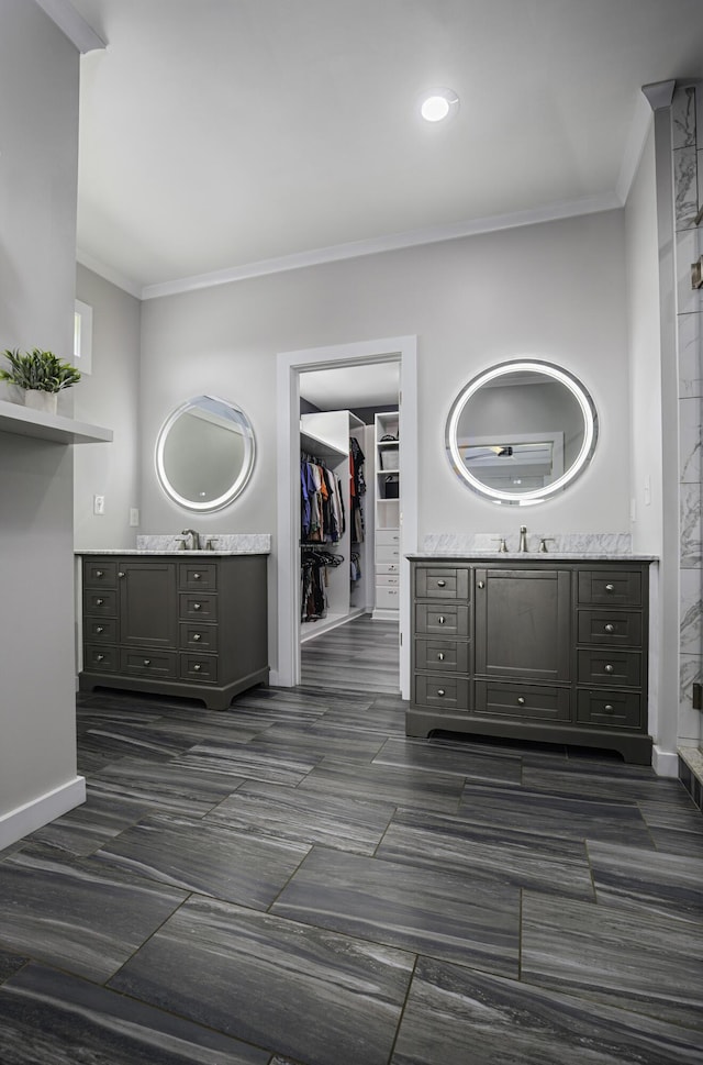 101 Creek Ridge Dr, Nicholasville, KY 40356 - full bath with crown molding, two vanities, a walk in closet, and baseboards