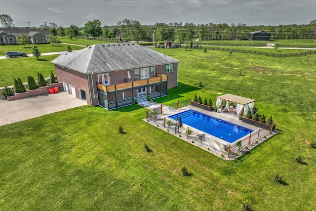 view from above of property featuring a pool area