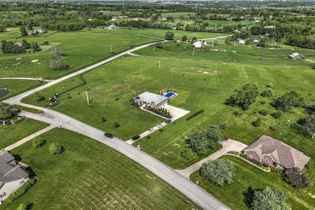 aerial view of property's location with rural landscape and a pastoral area