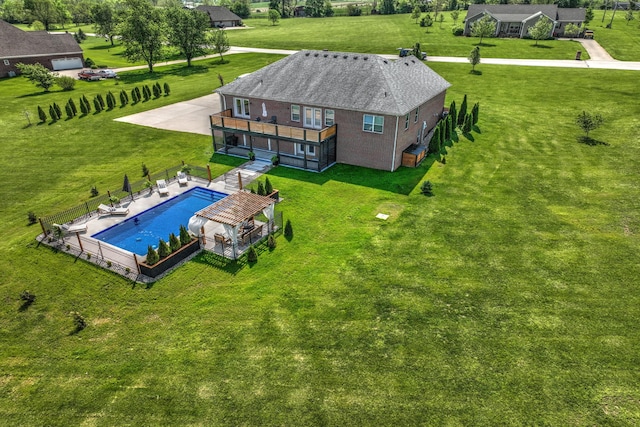 view of subject property featuring a pool area