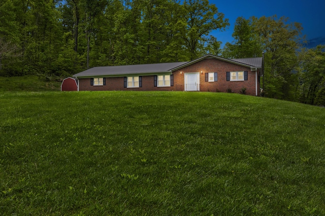 246 Pottersville Rd, Means, KY 40346 - ranch-style house featuring a front lawn, brick siding, and metal roof