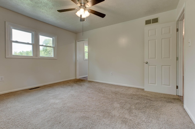 246 Pottersville Rd, Means, KY 40346 - carpeted empty room featuring ceiling fan, baseboards, and a textured ceiling