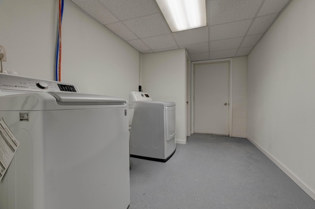246 Pottersville Rd, Means, KY 40346 - clothes washing area featuring washing machine and dryer and baseboards