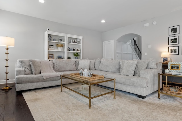 468 Lucille Dr, Lexington, KY 40511 - living room featuring arched walkways, recessed lighting, wood finished floors, baseboards, and stairway