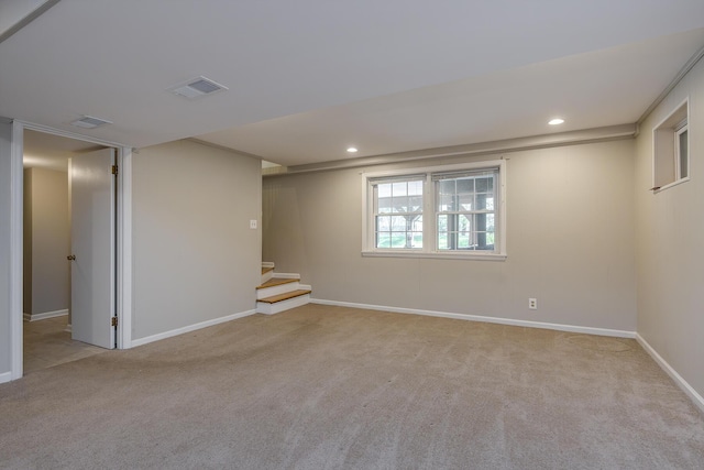 basement with carpet flooring, stairs, baseboards, and recessed lighting