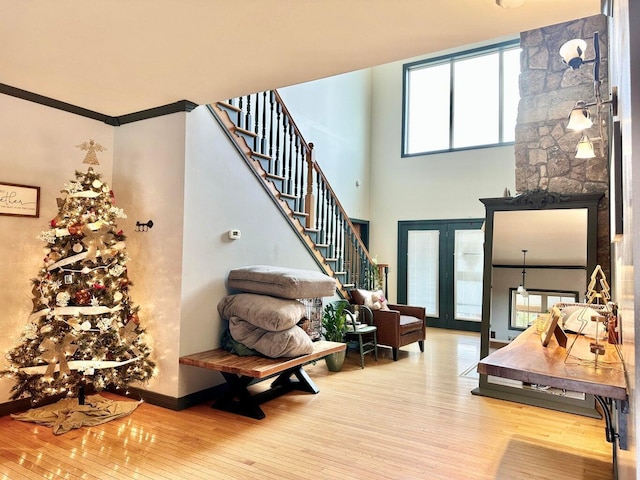 80 Jackson Rd, Somerset, KY 42503 - foyer with stairway, crown molding, a wealth of natural light, and hardwood / wood-style floors