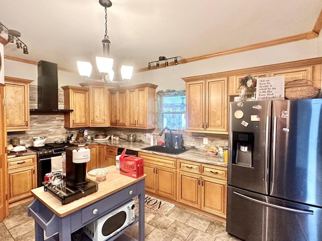 80 Jackson Rd, Somerset, KY 42503 - kitchen with hanging light fixtures, a sink, wall chimney exhaust hood, stainless steel fridge with ice dispenser, and gas stove