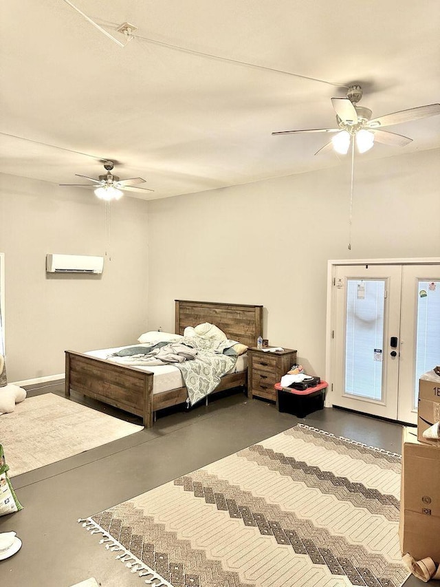 80 Jackson Rd, Somerset, KY 42503 - bedroom featuring finished concrete floors, french doors, a ceiling fan, and an AC wall unit