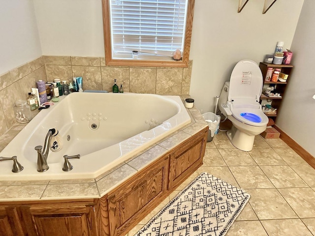 80 Jackson Rd, Somerset, KY 42503 - bathroom featuring toilet, baseboards, tile patterned floors, and a whirlpool tub