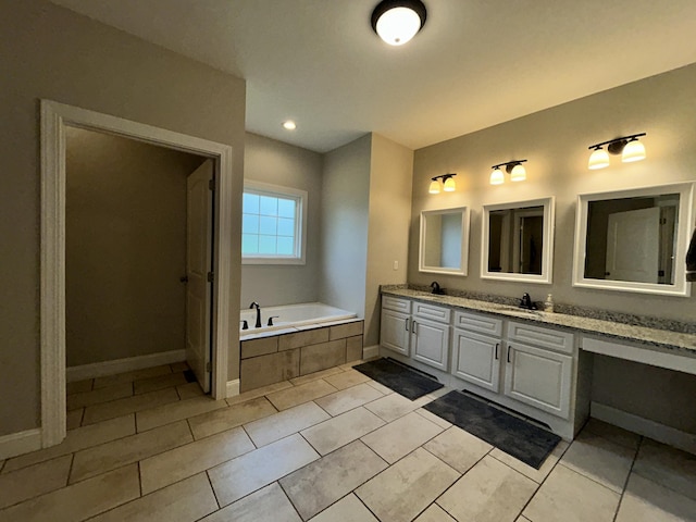 111 Fern Dr, Somerset, KY 42501 - bathroom with a sink, baseboards, tile patterned flooring, double vanity, and a garden tub
