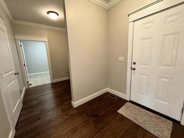 111 Fern Dr, Somerset, KY 42501 - foyer entrance featuring visible vents, baseboards, ornamental molding, and dark wood-style floors