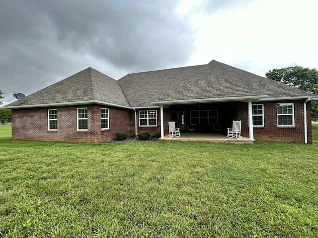 111 Fern Dr, Somerset, KY 42501 - rear view of house featuring a patio, a shingled roof, and brick siding