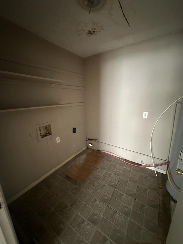 washroom featuring hookup for a washing machine and baseboards