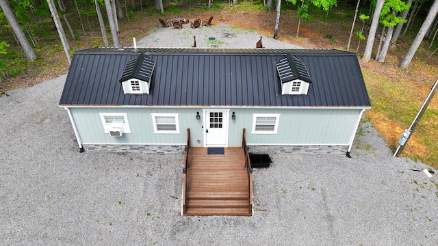 view of front of home featuring metal roof