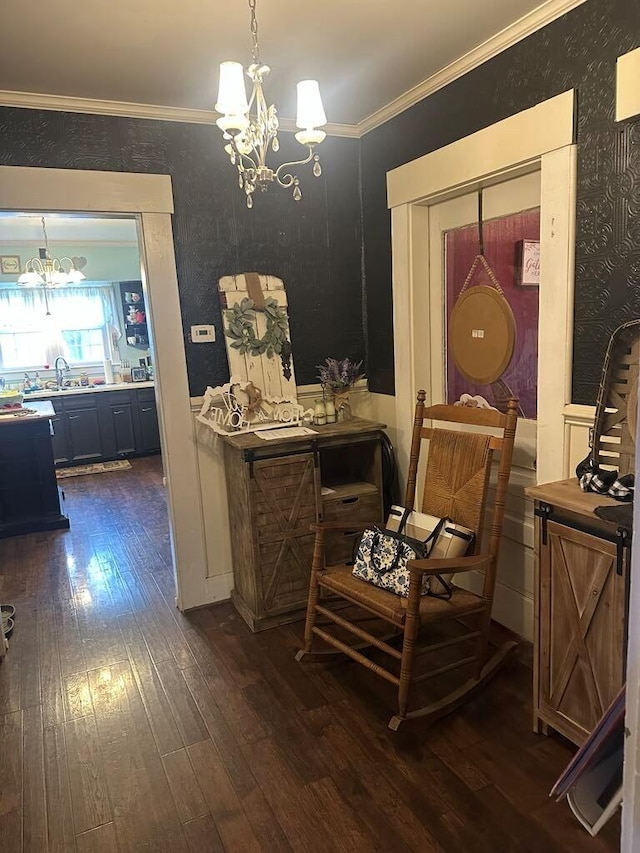 225 Mt Sterling Ave, Flemingsburg, KY 41041 - dining area with wallpapered walls, crown molding, a chandelier, and dark wood-style floors