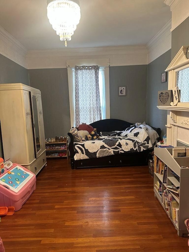 225 Mt Sterling Ave, Flemingsburg, KY 41041 - bedroom featuring an inviting chandelier, crown molding, and wood finished floors