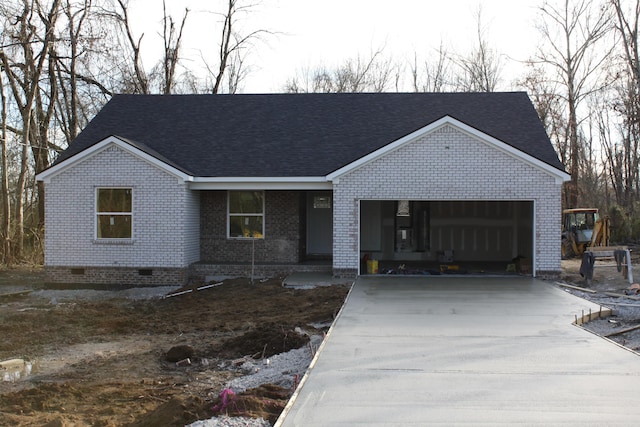 single story home featuring crawl space, concrete driveway, a garage, and brick siding