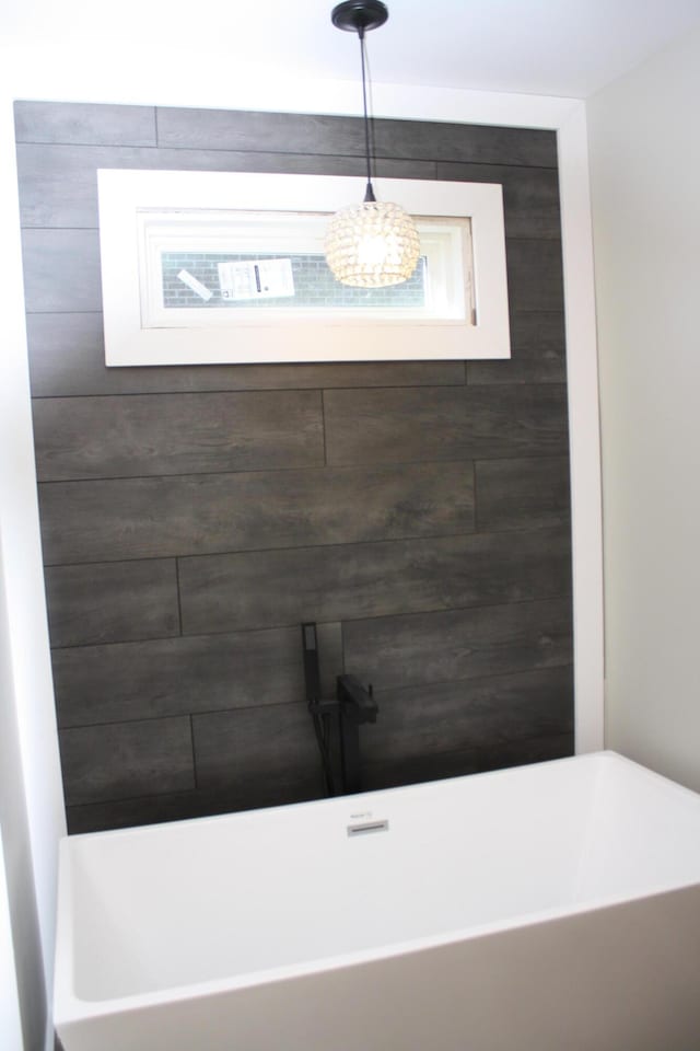 bathroom with a freestanding bath
