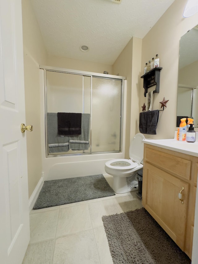 100 Dillon Ct, Berea, KY 40403 - full bath with enclosed tub / shower combo, vanity, toilet, and a textured ceiling