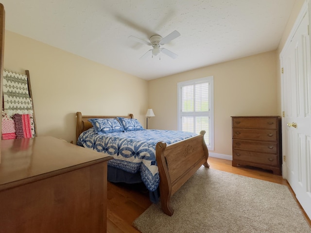 100 Dillon Ct, Berea, KY 40403 - bedroom with a ceiling fan, baseboards, and light wood-style flooring