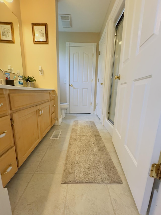 100 Dillon Ct, Berea, KY 40403 - full bathroom with a stall shower, toilet, vanity, and visible vents