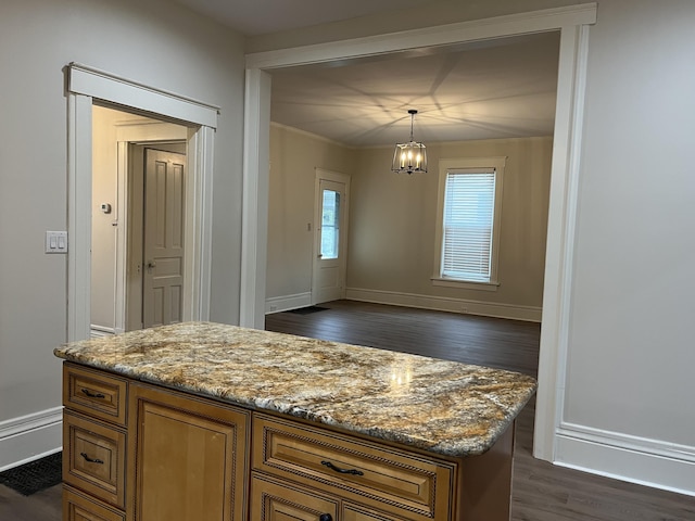 211 S Alta Ave, Danville, KY 40422 - kitchen with brown cabinetry, dark wood finished floors, ornamental molding, light stone countertops, and a chandelier