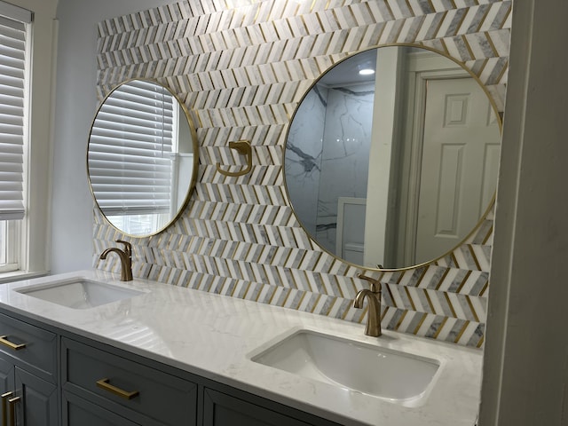 211 S Alta Ave, Danville, KY 40422 - bathroom featuring decorative backsplash and double vanity