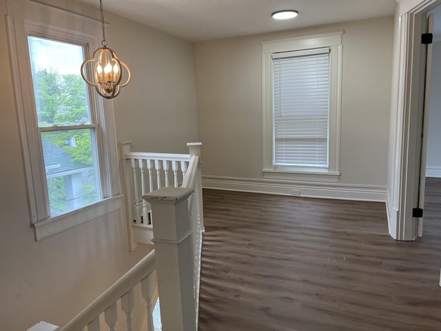 211 S Alta Ave, Danville, KY 40422 - hall featuring an upstairs landing, dark wood-style floors, and a chandelier