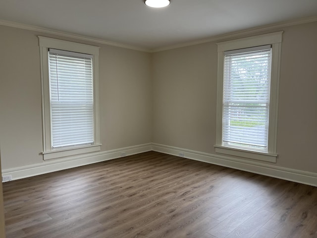 211 S Alta Ave, Danville, KY 40422 - spare room with dark wood-type flooring and ornamental molding