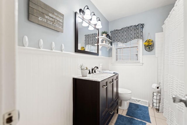 202 Leimaur Dr, Richmond, KY 40475 - full bath with wainscoting, toilet, vanity, tile patterned floors, and a shower with curtain