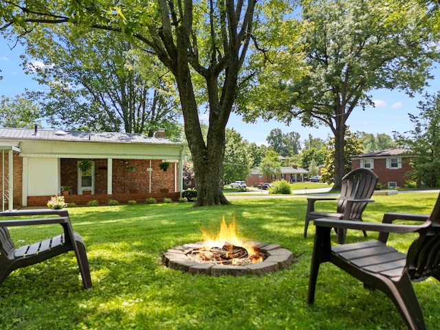 202 Leimaur Dr, Richmond, KY 40475 - view of grassy yard with an outdoor fire pit