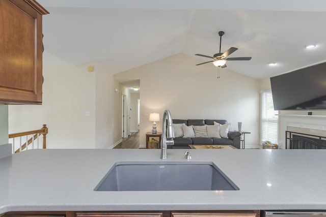 1208 Four Wynds Trl, Lexington, KY 40515 - kitchen with a sink, lofted ceiling, ceiling fan, light countertops, and open floor plan