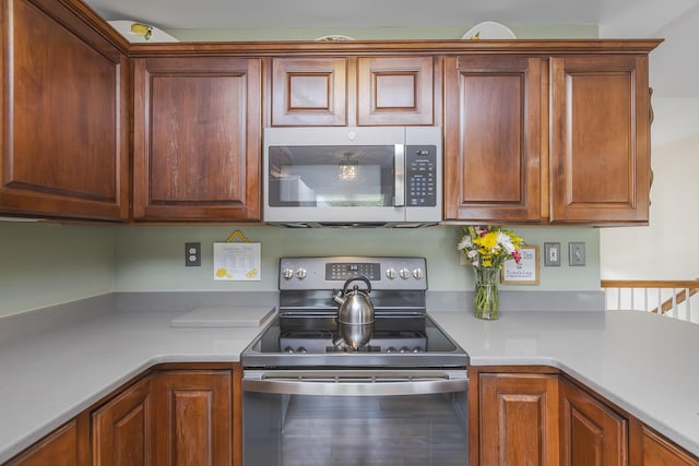 1208 Four Wynds Trl, Lexington, KY 40515 - kitchen with appliances with stainless steel finishes and light countertops