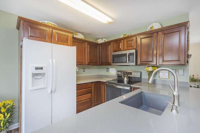 1208 Four Wynds Trl, Lexington, KY 40515 - kitchen with stainless steel appliances, a sink, and light countertops