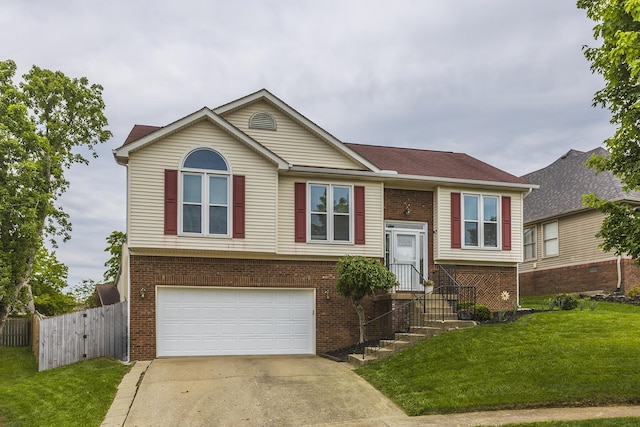 1208 Four Wynds Trl, Lexington, KY 40515 - bi-level home with brick siding, an attached garage, and concrete driveway