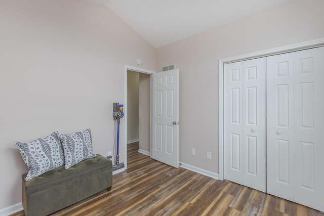 1208 Four Wynds Trl, Lexington, KY 40515 - living area with lofted ceiling, wood finished floors, and baseboards