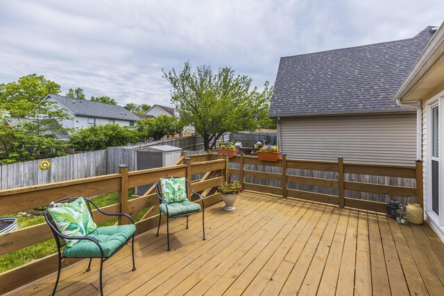 1208 Four Wynds Trl, Lexington, KY 40515 - deck featuring a storage unit, an outdoor structure, and a fenced backyard