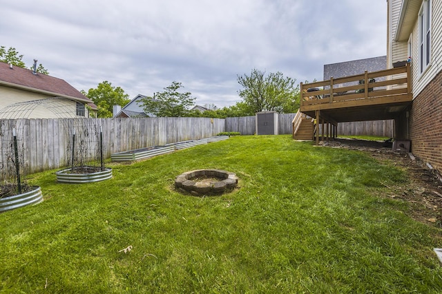 1208 Four Wynds Trl, Lexington, KY 40515 - view of yard featuring a fire pit, a shed, a deck, an outdoor structure, and stairway