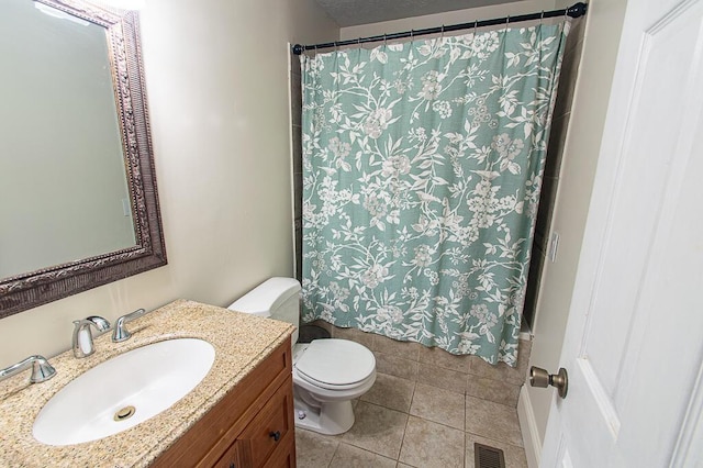 121 Meredith Ave, Frankfort, KY 40601 - bathroom with toilet, tile patterned floors, and vanity