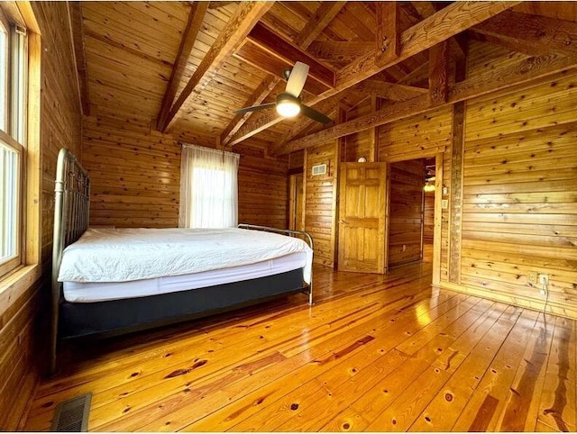 792 Tuggle Rd, Lancaster, KY 40444 - bedroom with wooden walls, wooden ceiling, beamed ceiling, hardwood / wood-style flooring, and high vaulted ceiling