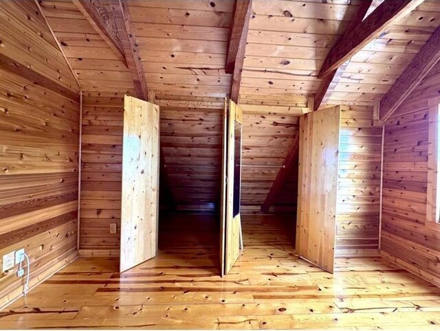 792 Tuggle Rd, Lancaster, KY 40444 - bonus room featuring light wood-type flooring, wood ceiling, and wood walls