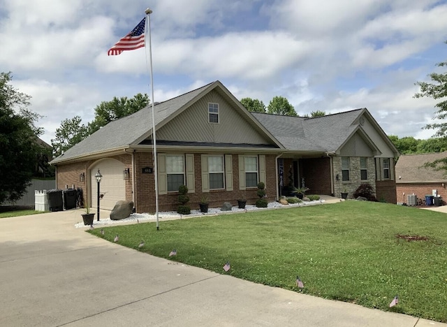 ranch-style home with concrete driveway, a garage, brick siding, and a front lawn