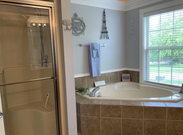 full bathroom featuring a stall shower and a garden tub