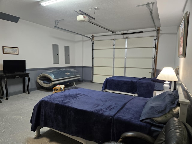 bedroom featuring baseboards, a textured ceiling, a garage, and electric panel